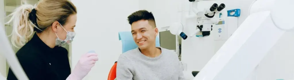 doctor and patient smiling to each other