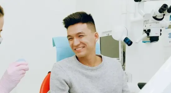 doctor and patient smiling to each other